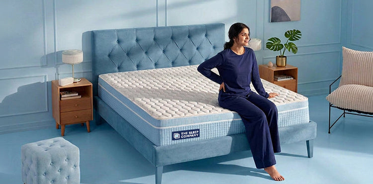 Data center with blue lighting showing people working with technology