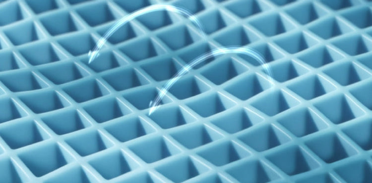 Data center with blue lighting showing people working with technology